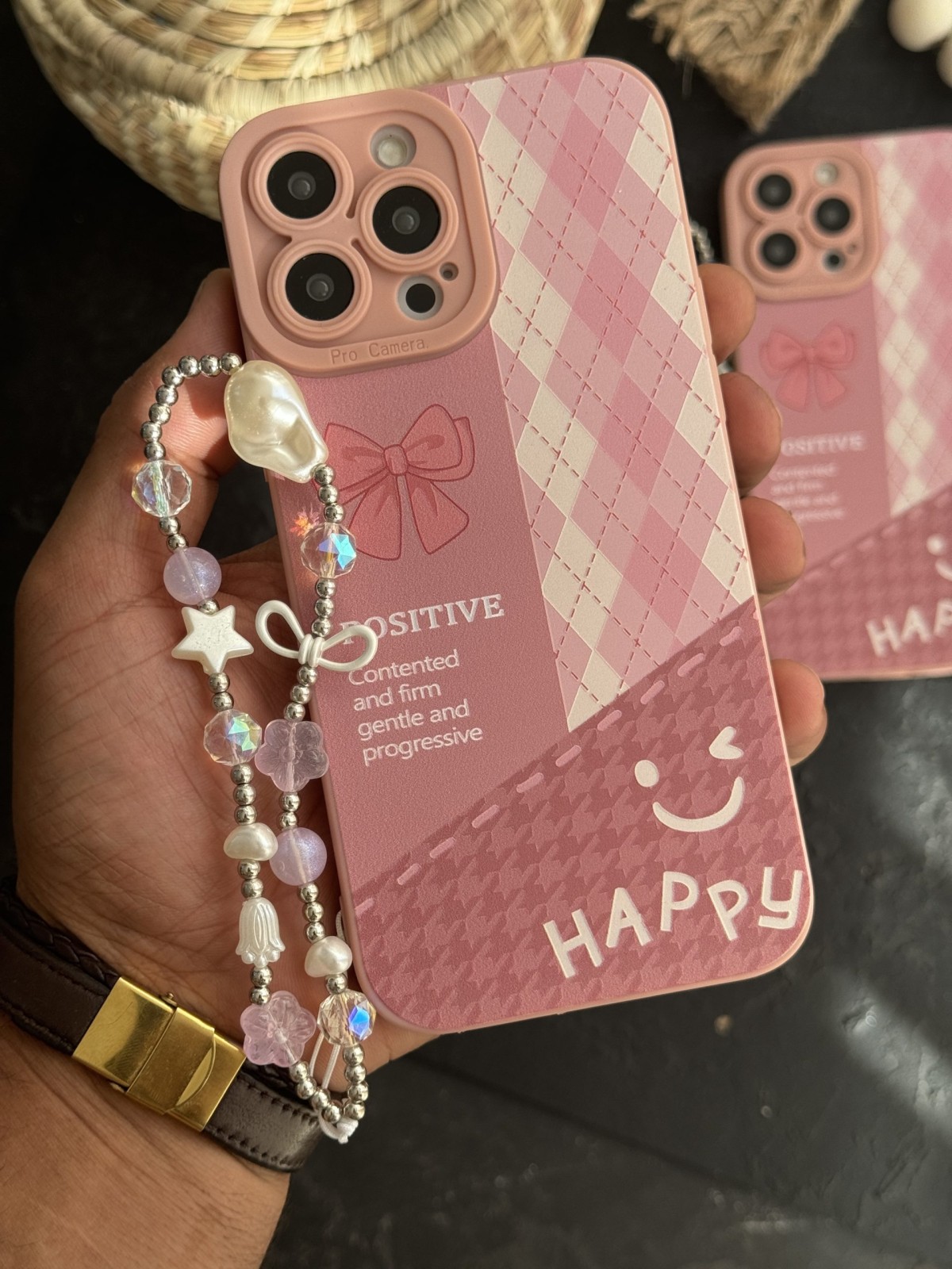 قاب موبایل آیفون پاپیون لبخند چهارخونه صورتی بندست ( بدون بند )